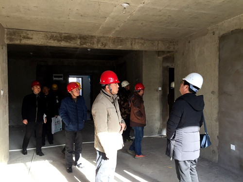 天工公司土建四部神木新村神南華府27、28#樓順利通過竣工驗收