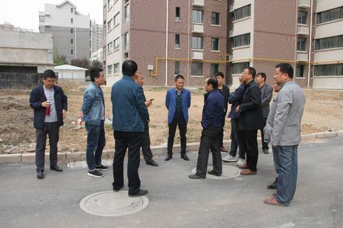 銅煤公司承建的銅煤2#小區(qū)水仙居5、6、7、8#樓順利通過竣工驗收