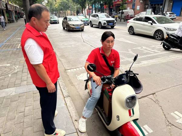 陜煤建設(shè)機電安裝公司：交通文明勸導(dǎo)，我們在“路”上