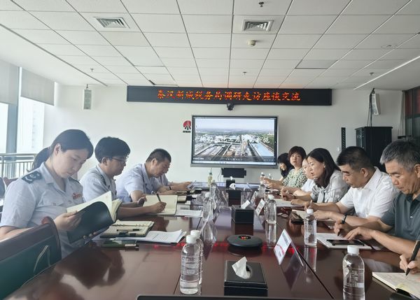 秦漢新城稅務局黨委委員、副局長劉明俊一行到陜煤建設天工公司走訪座談