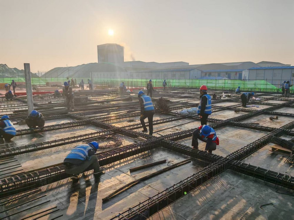 奮戰(zhàn)十八晝夜，澆筑信陽新篇章